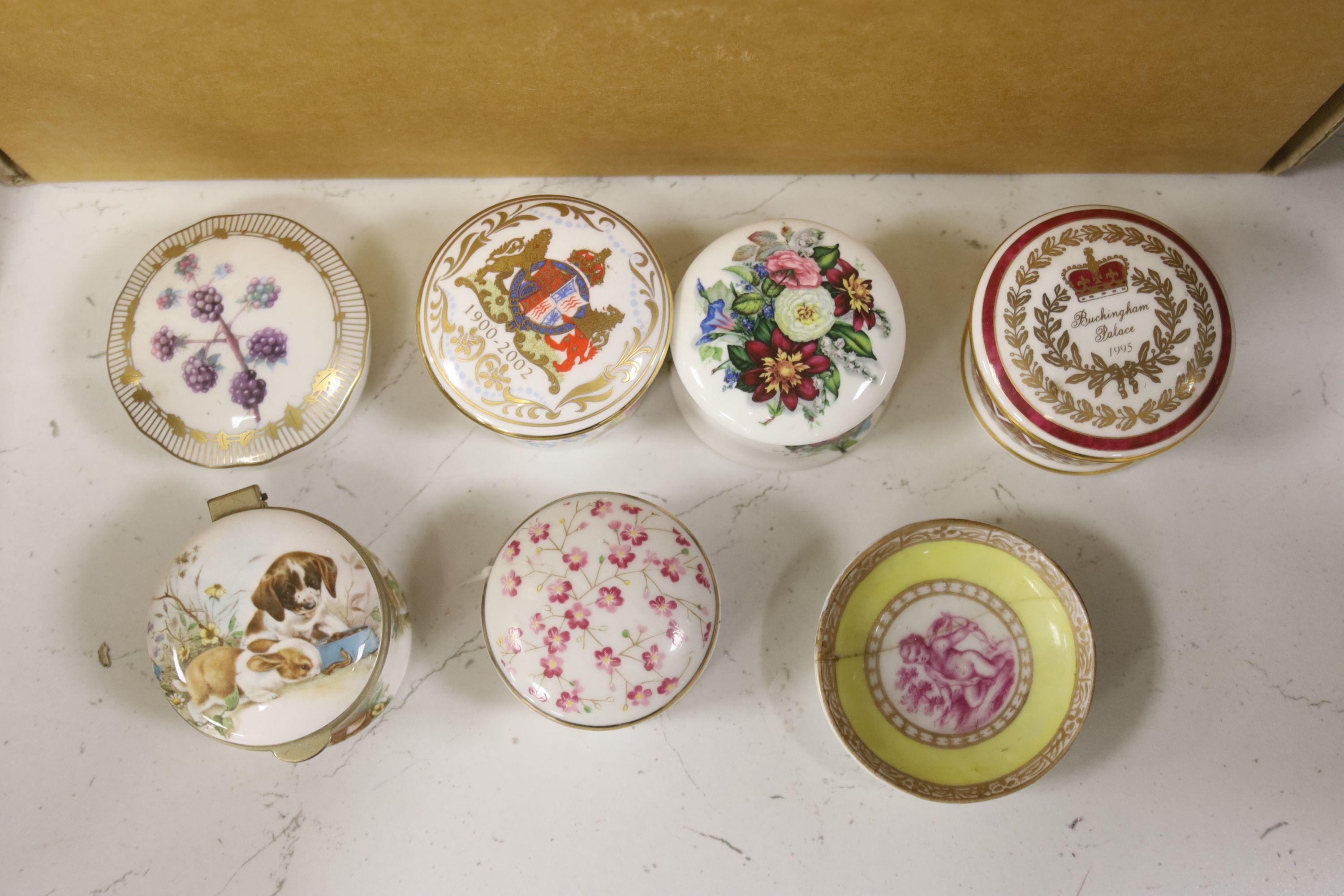 Assorted porcelain boxes and four small prints